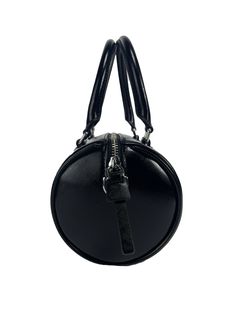 Style: Marc Jacobs The Duffle Bag x Looney Tunes Road Runner Crossbody Bag Material: Shiny Leather Features: Adjustable/Detachable Crossbody Strap Measures: 8.25" W x 5.5" H x 4.5" D MSRP: $450 Looney Tunes, Marc Jacobs, Duffle Bag, Crossbody Bag, Leather