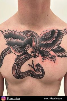 a man with an eagle and snake tattoo on his chest