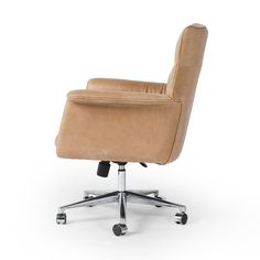 Top-grain leather and polished aluminum fuse for a modern office chair perfectly sized for executive desks. Casters plus height adjustability add ease. Leather Desk Chair, Executive Desks, Spindle Bed, Living Room Decor Pillows, Modern Office Chair, Chair Storage, Swivel Office Chair, Leather Desk, Tan Top