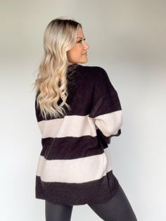 This luxurious oversized sweater is crafted from ultra soft fabric, providing outstanding comfort and stretch. The classic striped pattern is timelessly elegant and the relaxed fit ensures it will be a staple in your wardrobe for seasons to come. Whether you are out for shopping, brunch, dinner or drinks, this sweater will add a sophisticated and classy touch to your winter wardrobe. 63% Acrylic 24% Nylon 10% Wool 3% Spandex Hand wash cold. Chic Striped Crew Neck Sweater, Oversized Striped Long Sleeve Sweater, Cozy Striped Sweater For Layering, Oversized Striped Long Sleeve Cardigan, Trendy Oversized Striped Sweater, Striped Long Sleeve Sweater For Loungewear, Cozy Striped Sweater For Fall, Trendy Horizontal Stripe Winter Sweater, Trendy Horizontal Stripe Sweater For Winter