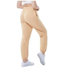 Stay stylish and comfortable in our women's baggy sweatpants featuring a unique design with two side pockets and an adjustable drawstring wide elastic waist for a custom fit. These wide-leg pants with elastic cinch bottom offer a loose fit and athletic look. The active high-waisted sweatpants are perfect for workouts, lounging, and casual wear in spring, fall, and winter. With extra-long length and fleece fabric, these joggers provide warmth and style. The convenient two side pockets allow you t Baggy Sweats With Elastic Waistband For Leisure, Comfortable Baggy Bottoms With Ribbed Waistband, Baggy Solid Joggers With Side Pockets, High Waist Joggers With Elastic Waistband, Baggy Joggers With Side Pockets, Baggy High-waisted Sweatpants With Elastic Waistband, Comfortable Baggy Sweatpants With Ribbed Waistband, Comfortable Wide Leg Joggers With Side Pockets, Baggy Wide Leg Joggers With Side Pockets