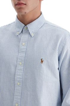 This casual Polo Ralph Lauren shirt is made of striped Oxford cotton and features the iconic Pony logo embroidered on the chest. The design includes a button-down collar, classic cuffs, and an American-style placket with a back yoke and box pleat. The model is 182 cm tall and wears size L. Composition: 100%CO Ralph Lauren Logo, Versace Outfit, Knitwear Dress, Equestrian Style, Knitwear Tops, Ralph Lauren Shirt, Dress Trousers, Trouser Jeans, Logo Embroidered