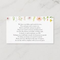 a white card with flowers on it