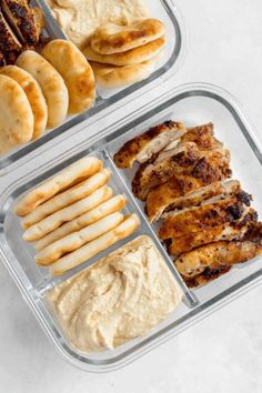 two plastic containers filled with different types of food