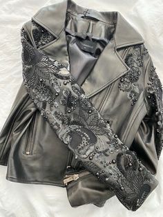 Norr Hammour  Sophia Zip-Front Lambskin Leather Jacket w/ Studded Embroidered Sleeves Size 40 Sold out everywhere!  100% authentic!  Purchased in Neiman Marcus  Retail: $1150 Amazing cropped leather jacket In immediate condition The leather on this is like butter -so soft! Sleeve: 23" Chest when zipper 18: Shoulder to hem: 19" Amazing accentuated zippers Sold as you see in photos This will ship wish signature and insurance  Gentle signs of wear means any and all flaws are mentioned in the listin Fitted Long Sleeve Embellished Leather Jacket, Fitted Embellished Leather Jacket With Long Sleeves, Embellished Fitted Leather Jacket With Long Sleeves, Designer Leather Jacket For Party, Designer Embroidered Outerwear For Party, Designer Embroidered Outerwear For Evening, Designer Embroidered Evening Outerwear, Embroidered Sleeves, Lambskin Leather Jacket