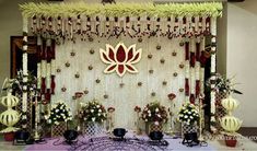 a decorated stage with flowers and candles