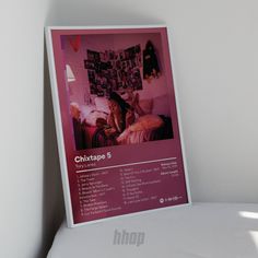 a white chair with a pink poster on it's back and the words chitapa 5 written in english