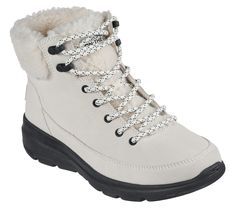 Stay warm throughout the season with Skechers On-the-GO Glacial Ultra - Woodlands. This casual cold-weather boot features a suede upper with sherpa lining, Skechers Air-Cooled Goga Mat insole and lightweight ULTRA GO cushioning. | Skechers Women's On-the-GO Glacial Ultra - Woodlands Boots Fabric Boots, White Ankle Boots, Cold Weather Boots, Skechers Women, Skechers Shoes, Soft Suede, Lace Boots, Lace Up Shoes, Snow Boots