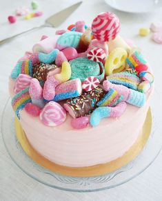 a cake with candy and candies on it