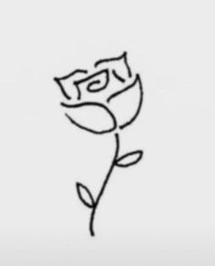 a drawing of a single rose on a white background with the word love written in black ink