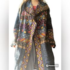 Wow This Is A Show Stopper Piece. Excellent Condition. Gorgeous Embroidered Detail. Not Easy To Find Online Anymore. Multicolor Long Sleeve Outerwear With Fair Isle Pattern, Long Black Embroidered Outerwear, Black Long Embroidered Outerwear, Hooded Embroidered Fall Outerwear, Traditional Hooded Winter Outerwear, Casual Long Embroidered Outerwear, Winter Cotton Outerwear With Multicolor Embroidery, Winter Multicolor Embroidered Cotton Outerwear, Black Folk Style Outerwear For Fall