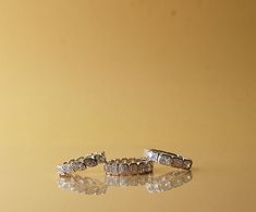 Dazzling Eternity Bands, made with love in white gold exude timeless elegance and captivating brilliance, making every moment unforgettable.
#devjewels #diamondrings #bands #eternitybands #marquisecut #emeraldcut Made With Love, Eternity Ring, Meaningful Gifts, Diamond Rings