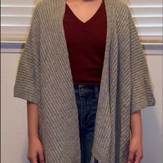 American Eagle Pancho Cardigan Cozy Wrap Outerwear For Spring, Cozy Spring Wrap Outerwear, Casual Cardigan With Batwing Sleeves, Casual Cardigan With Batwing Sleeve For Layering, Casual Shawl Poncho For Fall, Casual Fall Shawl Poncho, Casual Shawl Cardigan For Spring, Casual One Size Shawl Outerwear, Casual One-size Shawl Outerwear