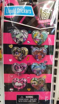 a package of heart shaped stickers in pink and black striped packaging on a shelf