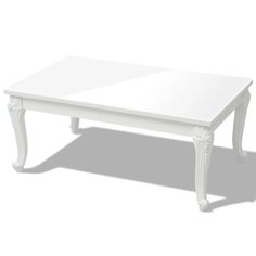 a white coffee table sitting on top of a white floor