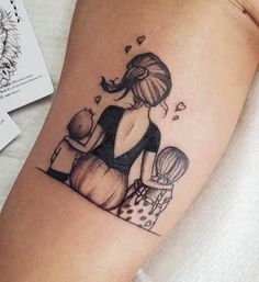 a woman and child tattoo on the arm