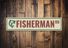 a fisherman sign on a wooden wall