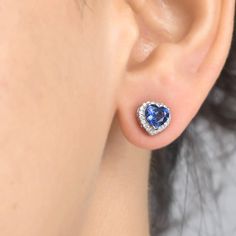 Blue sapphire diamond heart studs earring gold | Natural 5MM heart blue sapphire halo diamond stud tops earrings gold | Blue sapphire studs  GEMSTONE DETAILS : ✦ Gemstone : Blue Sapphire ✦ Gemstone Type : Natural ✦ Gemstone Size : 5.00 MM ✦ Gemstone Shape : Heart ✦ Number of Gemstones : 2 ✦ Gemstone Weight : 1.20 Carats ✦ Gemstone Grade : AAA DIAMOND DETAILS : ✦ Diamond Type : Natural ✦ Diamond Size : 1.00 mm ✦ Diamond Color : F-G ✦ Diamond Clarity : Slightly included ✦ Diamond Cut : Excellent - Blue Diamond Gemstone Earrings For Anniversary, Blue Gemstone Diamond Earrings For Anniversary, Blue Diamond Earrings For Anniversary, Blue Sapphire Diamond Earrings As Gift, Gift Blue Sapphire Diamond Earrings, Blue Diamond Earrings With Halo Design For Anniversary, Blue Sapphire Diamond Earrings With Halo Setting, Heart Cut Sapphire Jewelry With Diamond Accents, Sapphire Diamond Heart Cut Jewelry