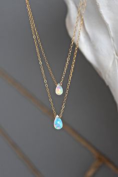 STYLE| Layered chains STONE| Tear drop Ethiopian Opals - Grade AAA Quality FINISH| 14k gold fill, 14k rose gold fill, sterling silver delicate chain LENGTH | 15 Layers Jewelry, Jewelry Cute, Body Chains, Tiffany Jewelry, Layered Chains, Diy Schmuck, Opal Necklace, Opal Jewelry, Pretty Jewellery