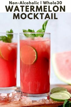 two glasses filled with watermelon cocktail on top of ice