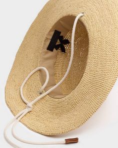 Spend your summer in the Riviera. Or at least pretend you are in this hat - an iconic, wide brimmed woven straw hat, trimmed with contrasting rope. rag & bone Women's Raffia Hat | Light Sand, Large (also in S,M) Raffia Hat, Scarf Hat, Wide Brimmed, Straw Hat, Womens Flip Flop, Rag & Bone, Floppy Hat, Bones, Sale Items