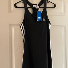 Adidas Black Racer Back Dress With White Stripes On Both Sides Of Dress. Above The Knee In Length. Built In Sports Bra. Very Stretchy Dress. Never Worn, Tags Still On! Racer Back Dress, Dress Above The Knee, Sport Skirt, Adidas Dress, Black Racer, Sports Skirts, Stretchy Dress, Adidas Sport, Back Dress