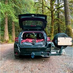 the back end of a car with its trunk open