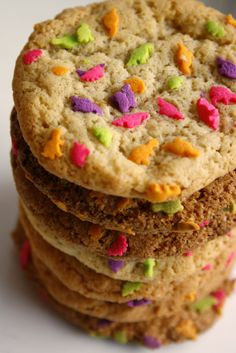 a stack of cookies with sprinkles on top