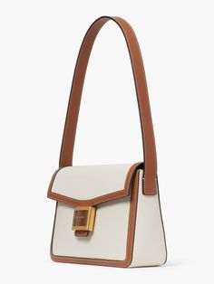 Take a trip back to the '90s (aesthetically speaking) with our new Katy shoulder bag. Made from colorblocked textured leather this sleek bag keeps you looking cool 24/7. | Kate Spade Katy Colorblocked Medium Shoulder Bag, Halo White Cute Handbags, Convertible Bags, Bag Ideas, Purse Accessories, Kate Spade Handbags