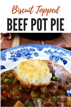 beef pot pie on a blue and white plate with the words biscuit topped beef pot pie