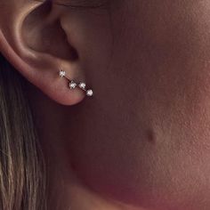 These elegant yet so minimalistic earrings are extremely lightweight. They look great in any hole, and the slightly larger diamonds draw the naked eye. We love the look of these floating diamonds for just the right amount of sparkle. Available in 14k yellow, rose, or white gold Gold Weight: 1.10g (refers to pair), Diamonds: 8=0.32ct (refers to pair) Height 2.8mm, Width 20mm (widest part), Thickness: 2mm Double safety butterfly clasp Made in New York City Minimalist White Gold Ear Climbers For Anniversary, Minimalist Diamond Eyes Earrings For Anniversary, Minimalist Rose Gold Diamond Drop Earrings, Minimalist Rose Gold Earrings With Diamond Accents, Rose Gold Minimalist Diamond Earrings For Pierced Ears, Minimalist Rose Gold Diamond Earrings With Accents, Minimalist Rose Gold Diamond Earrings, Minimalist Rose Gold Cubic Zirconia Diamond Earrings, Minimalistic Earrings