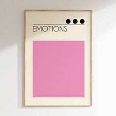 a pink poster hanging on the wall