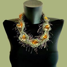 Discover the enchanting world of handmade artistry within my latest creation, a stunning handmade statement necklace inspired by the beauty of nature. This one-of-a-kind accessory is the perfect blend of style, craftsmanship, and organic charm, meticulously designed to enhance any outfit. **Craftsmanship:  Skillfully created using traditional crochet and hand-stitching techniques, ensuring a unique and high-quality finish. The design boasts a lace effect foundation that provides a delicate and a Nature-inspired Necklace With Natural Stones, Nature-inspired Freeform Necklace With Natural Stones, Nature-inspired Freeform Natural Stone Necklace, Bohemian Flower Necklaces With Natural Stones, Handmade Nature-inspired Jewelry, Handmade Bohemian Freeform Jewelry, Handmade Freeform Bohemian Jewelry, Unique Freeform Necklaces For Jewelry Making, Nature-inspired Jewelry With Unique Design For Gift