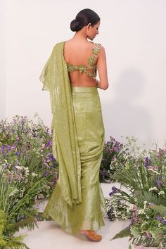 Green pre-stitched saree with ruffle trims. Paired with a padded blouse with floral hand embroidered straps. - Aza Fashions Fitted Cotton Silk Pre-draped Saree, Spring Festive Silk Pre-draped Saree, Fitted Cotton Silk Saree Dress, Summer Fitted Georgette Blouse Piece, Fitted Pre-draped Saree For Festive Spring Occasions, Fitted Wedding Saree For Spring, Fitted Spring Festive Pre-draped Saree, Fitted Draped Sets For Spring, Fitted Festive Spring Pre-draped Saree