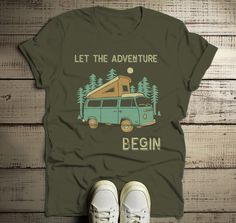 Men's Camping T Shirt Pop Up Van Retro Shirt Adventure Begin Tshirt Explore Nature Graphic Tee Start your next adventure off on the right foot in a graphic tee printed just for you. This retro t-shirt features a pop up style van which you just don't see anymore. The vintage retro style of this camping shirt will always be in style. It also features a forest, retro font and reads 'Let The Adventure Begin'. It doesn't matter where your next adventure takes you, enjoy the journey. Perfect for campi Mens Camping, Camp Shirts, Nature Shirts, Hoodie Size Chart, Cotton Gifts, Explore Nature, And So The Adventure Begins, Retro Shirts, Retro Tshirt