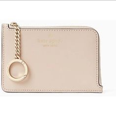 - Slim And Small Design - Keychain Ring - Smooth Leather - Two Way Spade Jacquard Lining - 3.4" H X 5" W - Kate Spade Foil Embossed Logo - Wallet With Zip Closure - 4 Credit Card Slots - Exterior Slip Pocket Pink Puma Shoes, Kate Spade Wallet Pink, Snap Bag, Kate Spade Card Holder, Keychain Ring, Red Wallet, Card Case Wallet, Coin Purse Wallet, Small Design