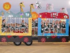 an amusement vehicle with people riding on the front and side, painted in bright colors