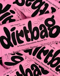 pink and black candy bar wrappers with the word dirtbab on them in cursive writing