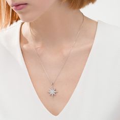 A beacon of style, this diamond pendant emits beguiling beauty. Created in sterling silver, this dazzling design showcases a sculpted eight-pointed star dangle sparkling with diamonds. Radiant with 1/2 ct. t.w. of diamonds and a bright polished shine, this pendant suspends along an 18.0-inch box chain that secures with a spring-ring clasp. Elegant Starburst Jewelry For Anniversary, Elegant Star Of David Diamond Necklace, Elegant White Gold Star Diamond Necklace, Elegant Sparkling Starburst Jewelry, Elegant Star-shaped White Gold Diamond Necklace, Elegant Star Diamond Necklace With Diamond Accents, Elegant Starburst Sparkling Jewelry, Elegant Star Shaped White Gold Diamond Necklace, Elegant Star-shaped Diamond Necklace With Accents