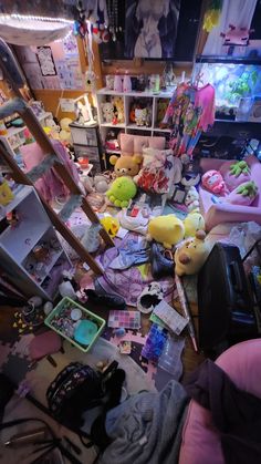 a messy room with stuffed animals and toys