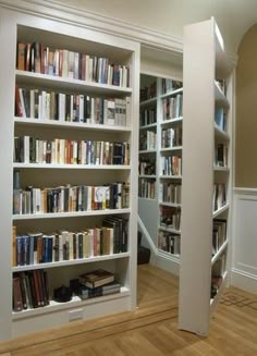 the bookshelves in this room are full of books