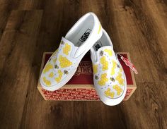 Honey Bee and Honey Comb Custom VansOff The Wall White Slip | Etsy White Slip On Vans, Vans Custom, Custom Vans Shoes, Bee Shoes, Vans Slip On Shoes, Painted Shoes Diy, Butterfly White, Custom Painted Shoes, Custom Shoes Diy