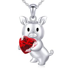 Has a pig or pig lover stolen your heart? This precious pig holding a heart necklace is custom made for our pig loving friends. It is solid sterling silver with your choice of 18K white, rose or yellow gold plating. Choose a red or purple CZ. We have a limited number of genuine Demantoid Garnet hearts available as well. Your beautifully detailed piggy will be approximately 1.25" X .25", a very nice size. The chain will be 18" sterling silver adjustable to 16" with your choice of white, rose or y Heart Pendant Jewelry For Valentine's Day Birthday, Red Necklaces For Valentine's Day, Red Necklace For Valentine's Day, Cute Silver Charm Necklace For Valentine's Day, Valentine's Day Red Sterling Silver Charm Necklace, Cute Silver Heart Necklace For Valentine's Day, Heart Cut Charm Necklaces For Valentine's Day, Cute Valentine's Day Pendant Necklace, Red Heart-shaped Jewelry For Gifts