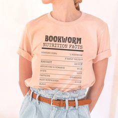 A list of nutritional facts for any bookworms, bibliophiles or book dragons out there. *This shirt is printed in the United States* *Made from 100% airline combed and ring-spun cotton* Our shirts are unisex. Please refer to the size chart in the picture for sizing. For a slimmer fit it is recommended to order a size down.  We print our t-shirts as customers order them so shipping times may vary.  For t-shirt care, we recommend washing your shirt inside out with like colors in cold water.  We don Cheap Bookish T-shirt With Funny Text, Cheap Bookish Shirt With Text Print, Book Tshirt Design, Bookworm Shirts, Bookish Pictures, Bookish Tshirt, Literary Shirts, Pretty Clothing, Bookworm Shirt