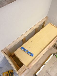 a wooden table with some tools on it