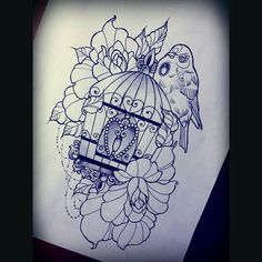 a bird sitting on top of a cage with flowers and leaves around it's neck