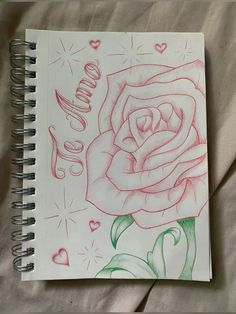 a drawing of a rose with the word love written in cursive writing on it