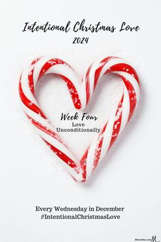 a candy cane in the shape of a heart with words international christmas love 2012 on it