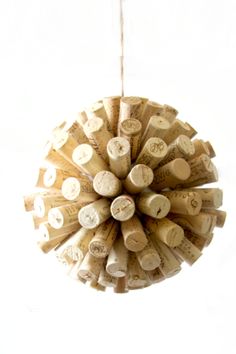 a bunch of wine corks hanging from a ceiling