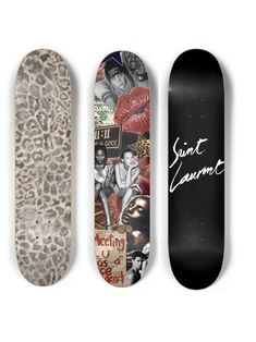 three skateboards with different designs on them, one is black and the other is white